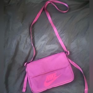 Nike 365 crossbody bag. Excellent condition. Pink and purple, super trendy.
